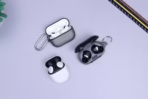Wireless earbuds with charging cases