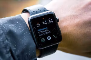 Fitness smartwatch on a runner's wrist